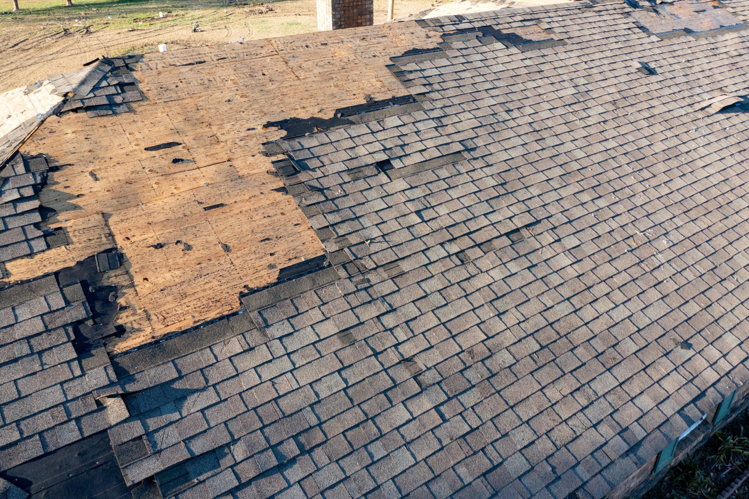 Storm-damaged roof prepared for re-roofing by Prescott experts