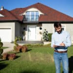 Professional roof inspector assessing a home in Prescott Valley