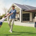 Family enjoying a secure home with a well-maintained roof